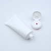 Tube en plastique cosmétique souple de tube de compression de lotion PE vide personnalisé avec dessus rabattable pour la surface de lavage du visage manipulée par estampage à chaud
