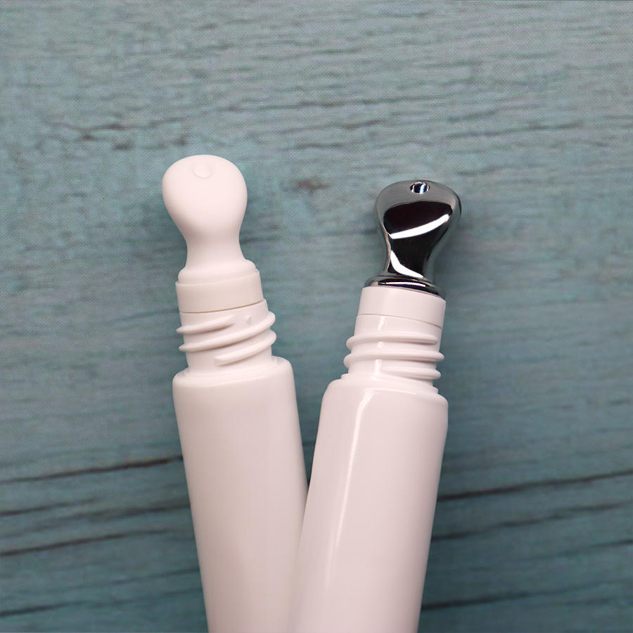 Tube en plastique de nouvelle série populaire avec applicateur en alliage de zinc ou en céramique Bouchon PETG Emballage de tube cosmétique en plastique Baume à lèvres Rouge à lèvres