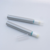 Tubes de brillant à lèvres Orange avec Logo personnalisé de 10ml, cosmétiques vides en plastique avec applicateur de brosse floquée pour le maquillage du visage et du masque