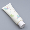 Tube en plastique souple personnalisé pour le lavage du visage et la lotion, emballage de crème pour les mains avec couvercle supérieur torsadé, conception personnalisée