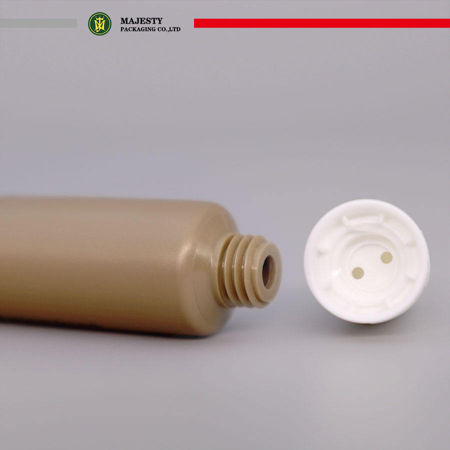 Tube en plastique OEM avec tête de brosse, estampage à chaud, manipulation de Surface pour fard à joues, crème pour les yeux, fond de teint, outil cosmétique avec Lotion