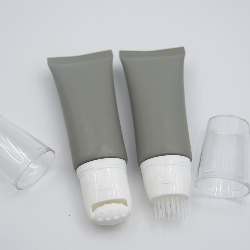 Tubes de crème cosmétique à fonction spéciale OEM, avec brosse en Silicone, boule à rouleau, lavage doux du visage et emballage de crème pour les yeux, Tube de MASSAGE