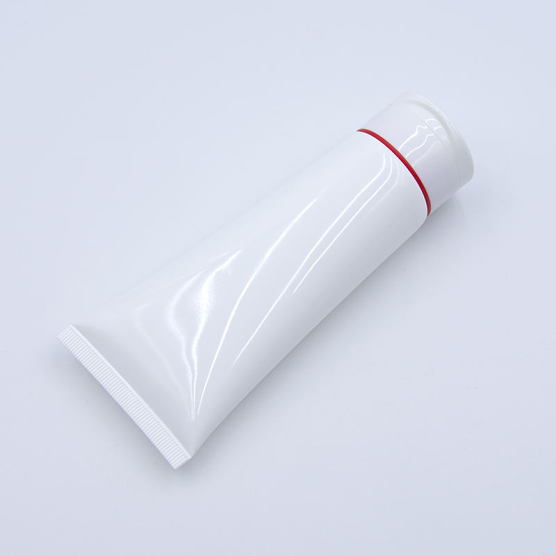 Tube en plastique cosmétique souple de tube de compression de lotion PE vide personnalisé avec dessus rabattable pour la surface de lavage du visage manipulée par estampage à chaud