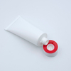 Tube en plastique cosmétique souple de tube de compression de lotion PE vide personnalisé avec dessus rabattable pour la surface de lavage du visage manipulée par estampage à chaud