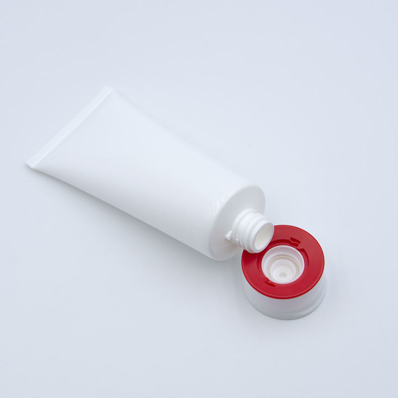 Tube en plastique cosmétique souple de tube de compression de lotion PE vide personnalisé avec dessus rabattable pour la surface de lavage du visage manipulée par estampage à chaud