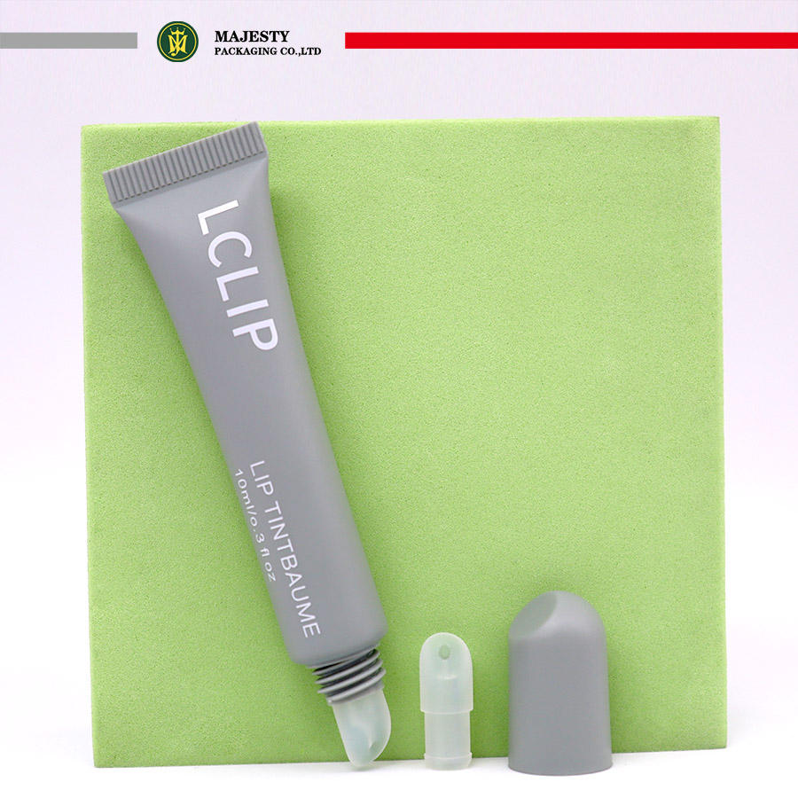 OEM et ODM Mini petits Tubes en plastique souple PE de 10 ml avec pointe en Silicone pointe PE brillant à lèvres bâton à lèvres baume à lèvres conception à presser