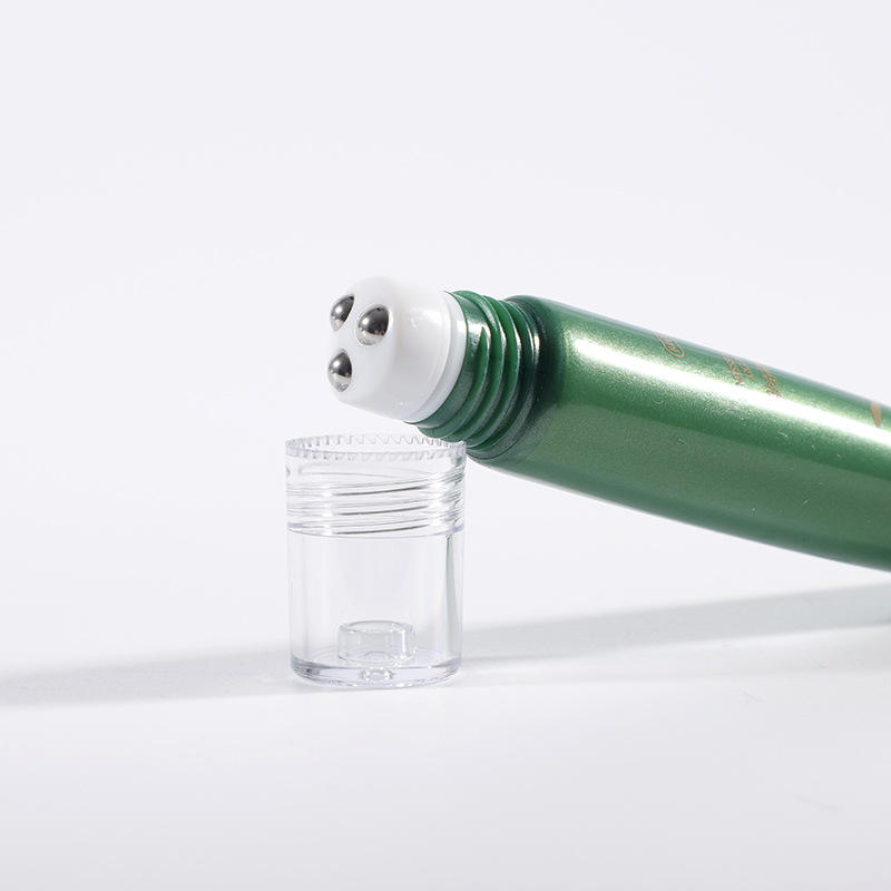 Tube de Lotion PE à presser cosmétique doux personnalisé avec boule à rouleau de Massage, Tubes d'emballage de sérum pour les yeux d'huile essentielle