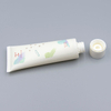 Tube en plastique souple personnalisé pour le lavage du visage et la lotion, emballage de crème pour les mains avec couvercle supérieur torsadé, conception personnalisée