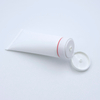 Tube en plastique cosmétique souple de tube de compression de lotion PE vide personnalisé avec dessus rabattable pour la surface de lavage du visage manipulée par estampage à chaud