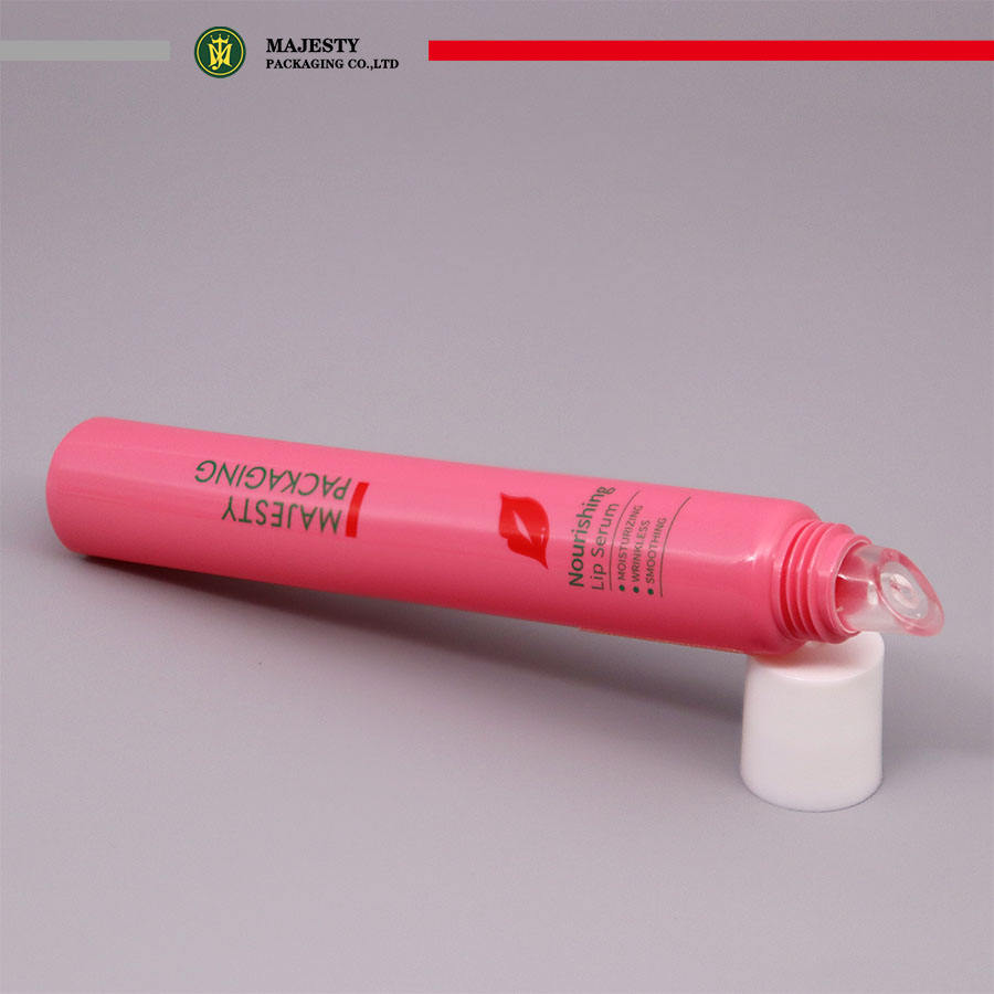 Tubes en plastique faits sur commande de couvercle d'emballage de baume à lèvres avec le tube en plastique de brillant à lèvres d'applicateur de silicone