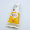 Tube à presser en plastique souple OEM avec couvercle rabattable pour crème pour les mains, lavage du visage, soins de la peau avec surface d'estampage à chaud, lotion cosmétique
