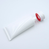 Tube en plastique cosmétique souple de tube de compression de lotion PE vide personnalisé avec dessus rabattable pour la surface de lavage du visage manipulée par estampage à chaud