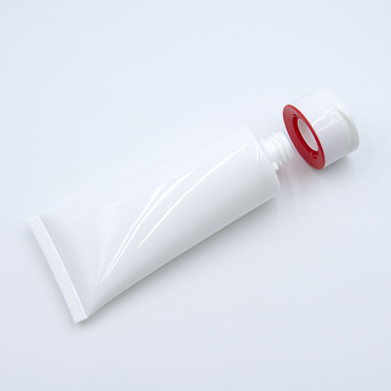 Tube en plastique cosmétique souple de tube de compression de lotion PE vide personnalisé avec dessus rabattable pour la surface de lavage du visage manipulée par estampage à chaud